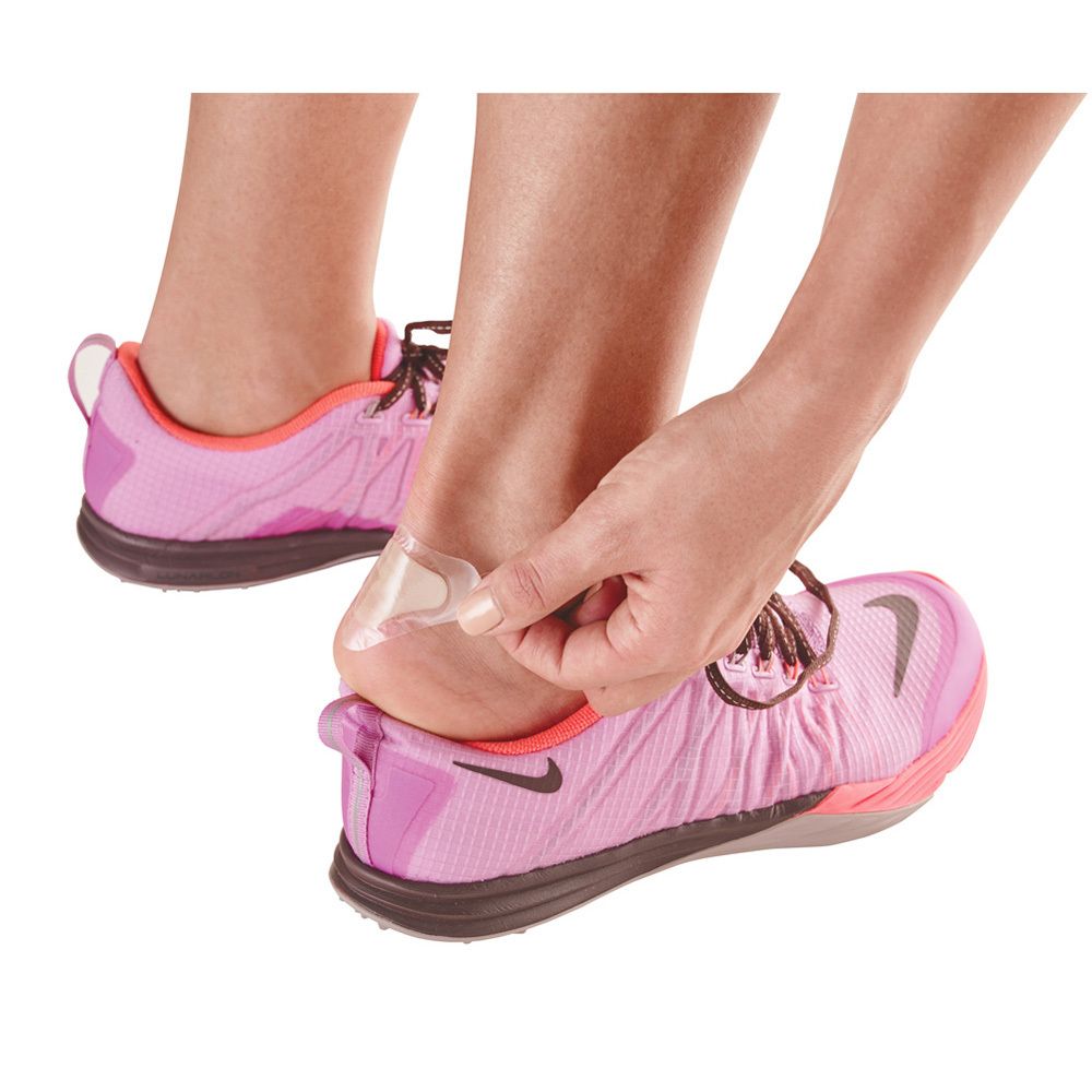 Pansement anti-ampoule beige, forme anatomique. Sur fond blanc.