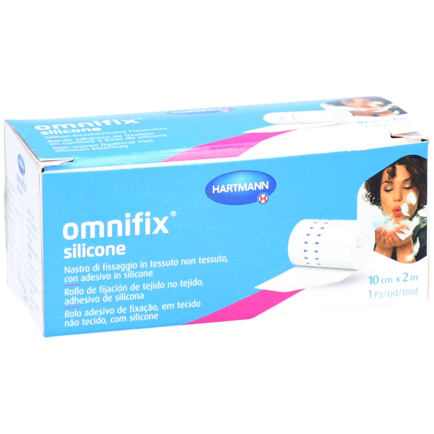 Emballage Hartmann Omnifix® Silicone. Rouleau 10 cm x 2 m. Boîte bleue avec nom du produit et femme soufflant des plumes.