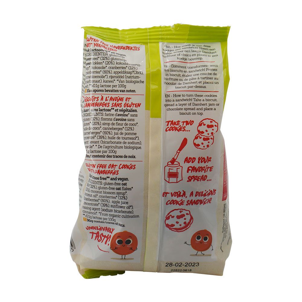 Dos du paquet de biscuits. Texte multilingue. Illustration: biscuits aux canneberges. Instructions pour un sandwich.