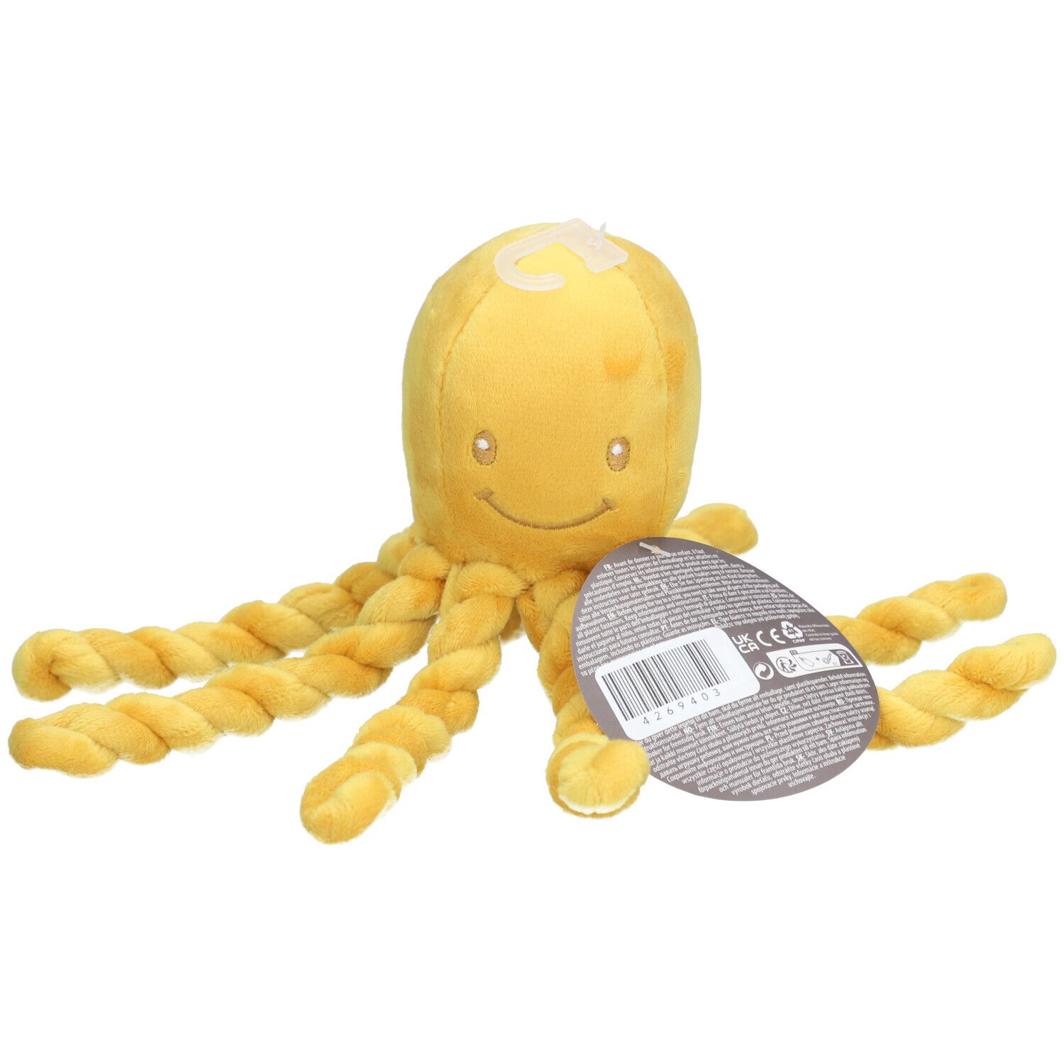 Poulpe en tissu jaune avec tentacules torsadées. Visage avec yeux et bouche. Étiquette avec code-barres.