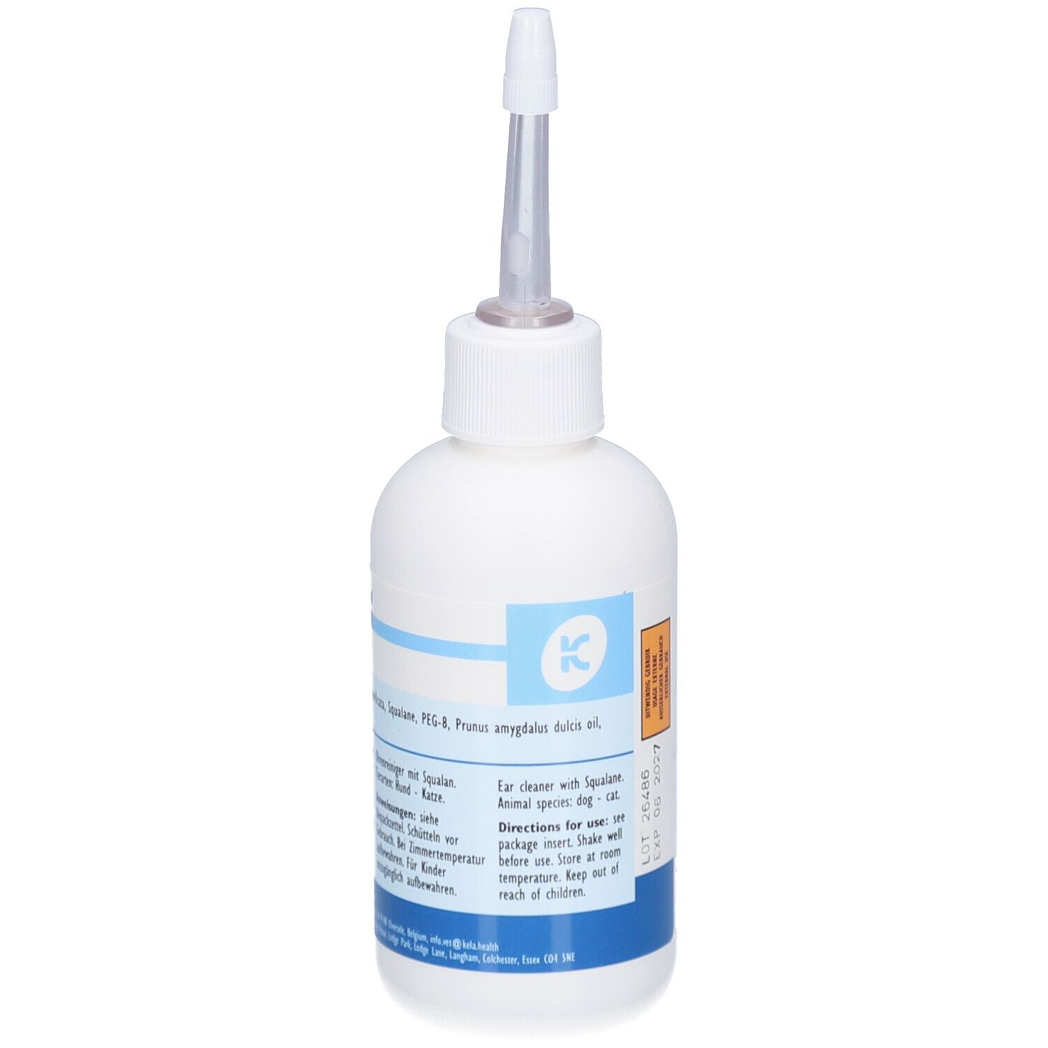 Flacon blanc avec applicateur. Étiquettes bleues avec texte. Kela Auri Cleaner. Pour chiens et chats.