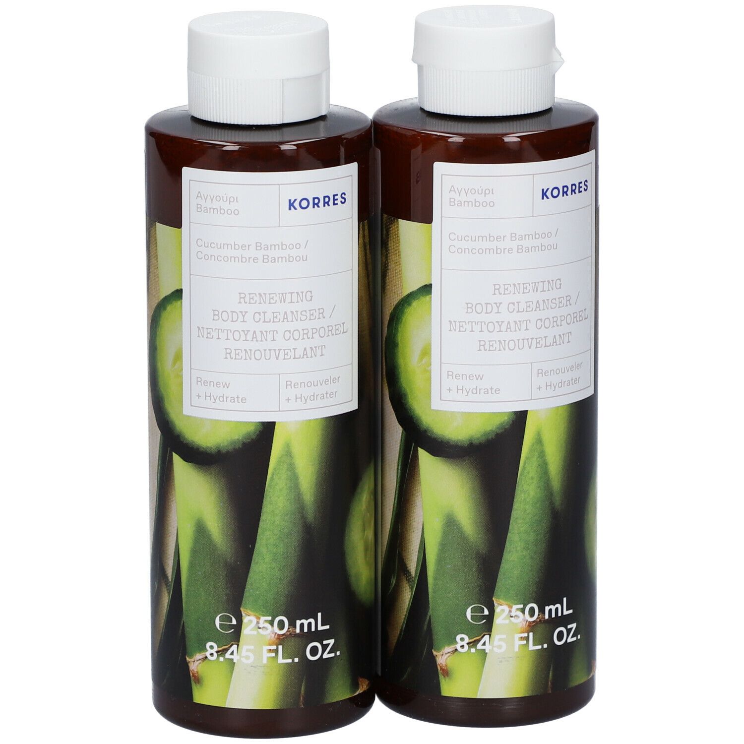 Deux flacons de nettoyant corporel avec bouchons blancs. Inscription : KORRES, Concombre & Bambou, Renewing Body Cleanser.