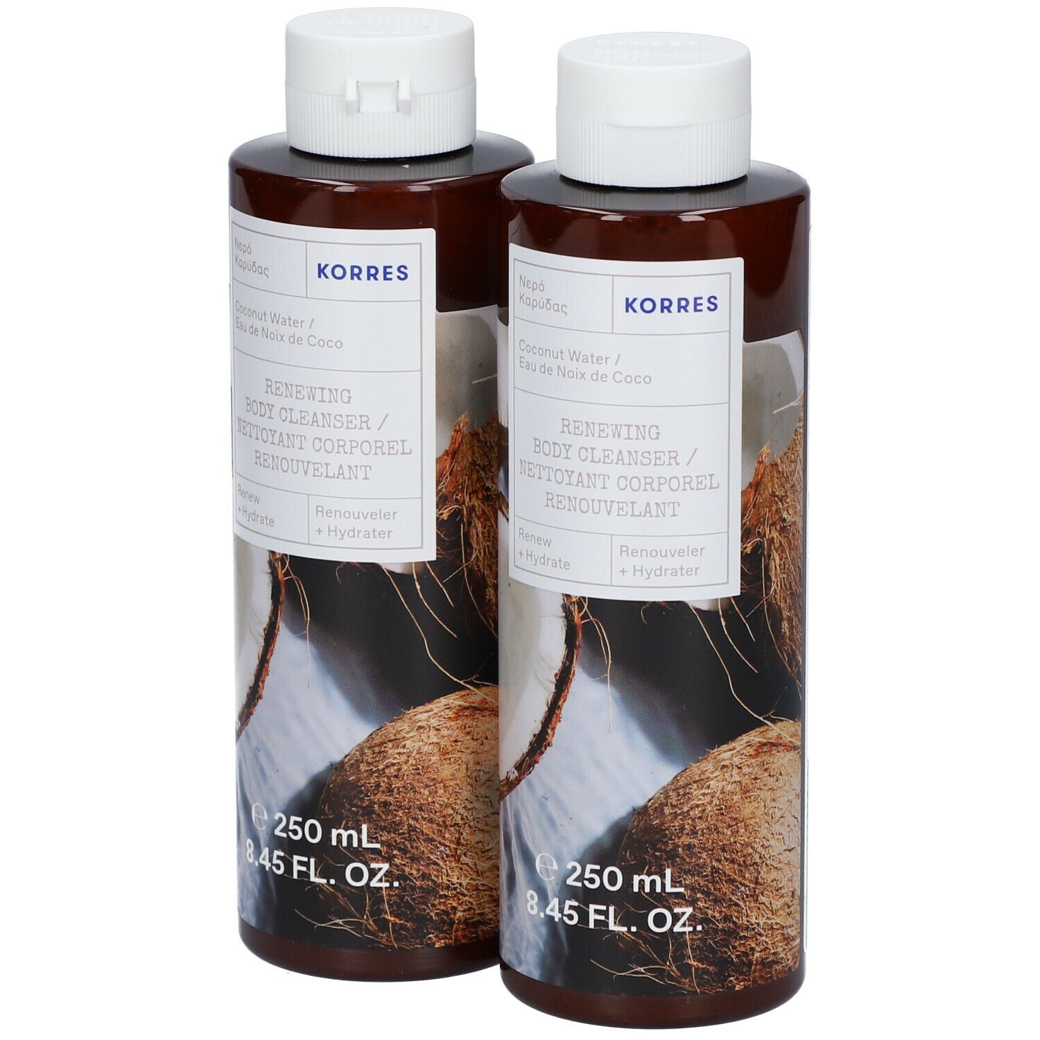 Deux flacons de nettoyant corporel KORRES. Bouteilles marron avec bouchons et étiquettes blancs. Illustration de noix de coco.