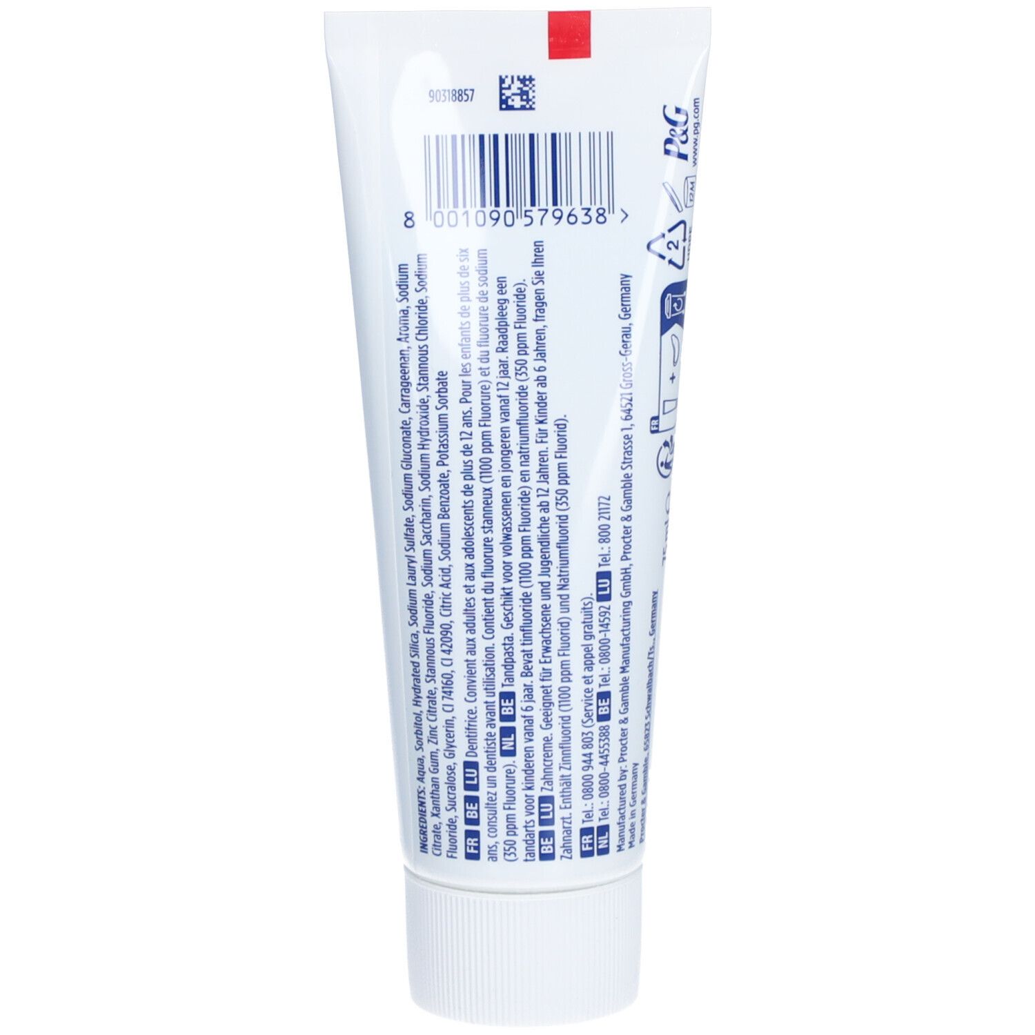 Dos d'un tube de dentifrice blanc. Contient les ingrédients et les avertissements. Code-barres et informations du fabricant.