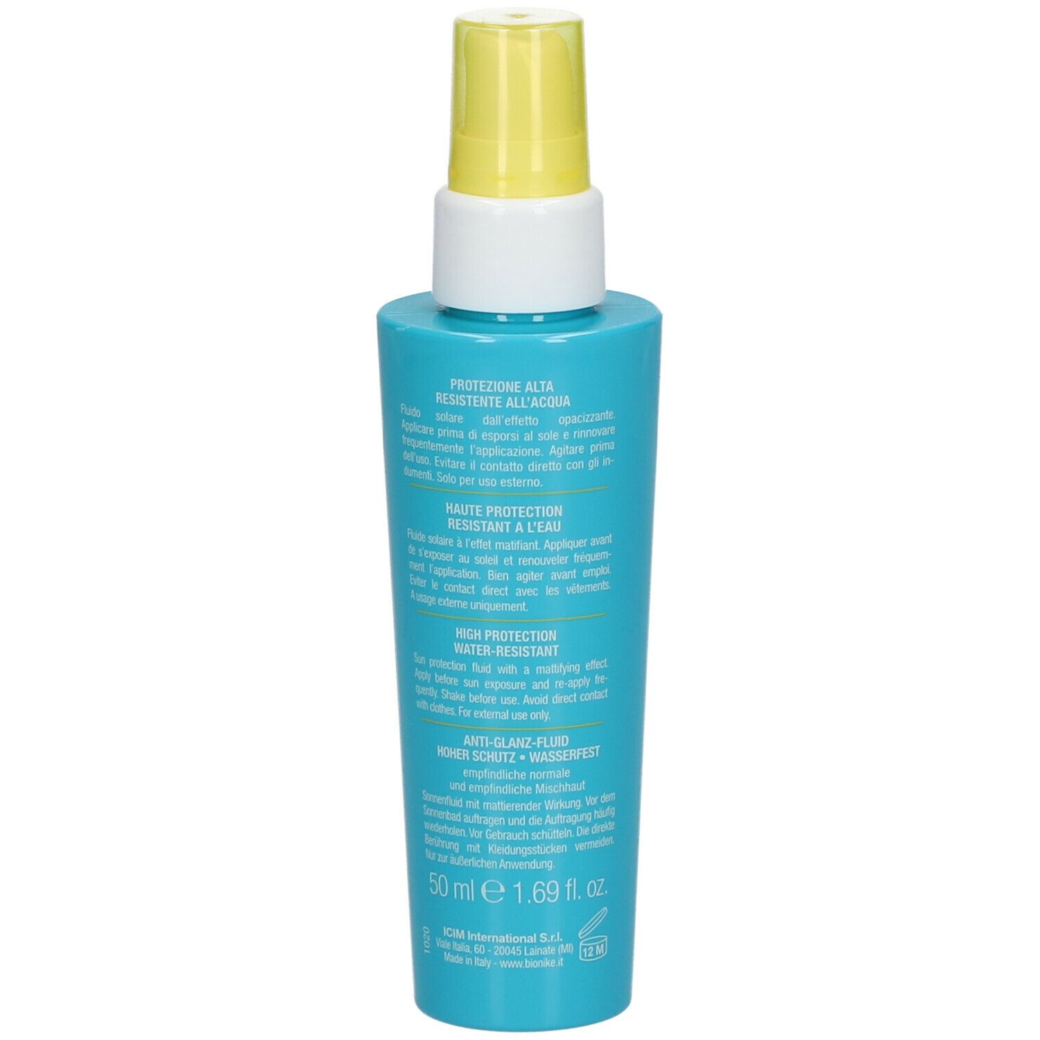 Dos d'un flacon turquoise avec vaporisateur jaune. Texte en plusieurs langues, dont italien et français.
