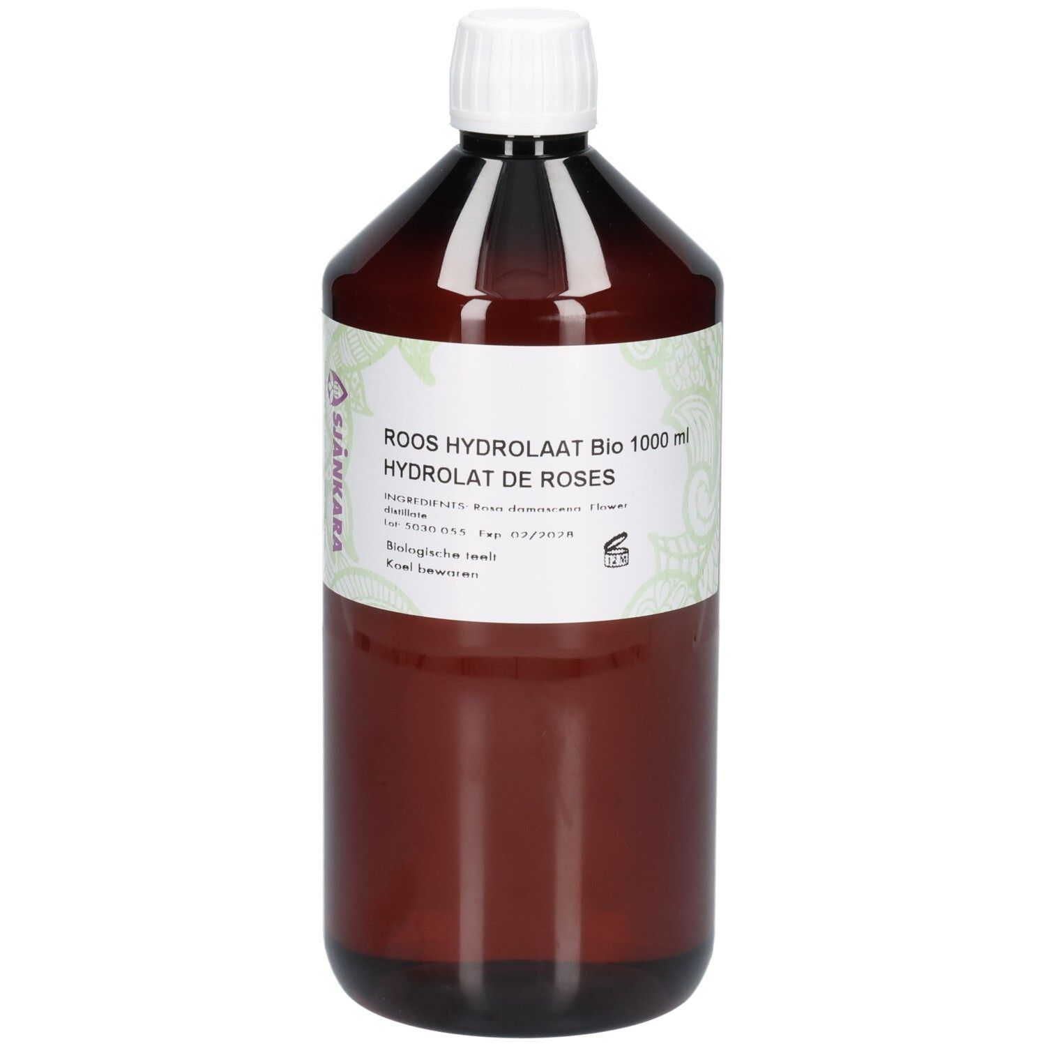 Flacon brun avec bouchon blanc. Étiquette avec texte: Roos Hydrolaat Bio, Hydrolat de Roses. Marque: Sjankara.