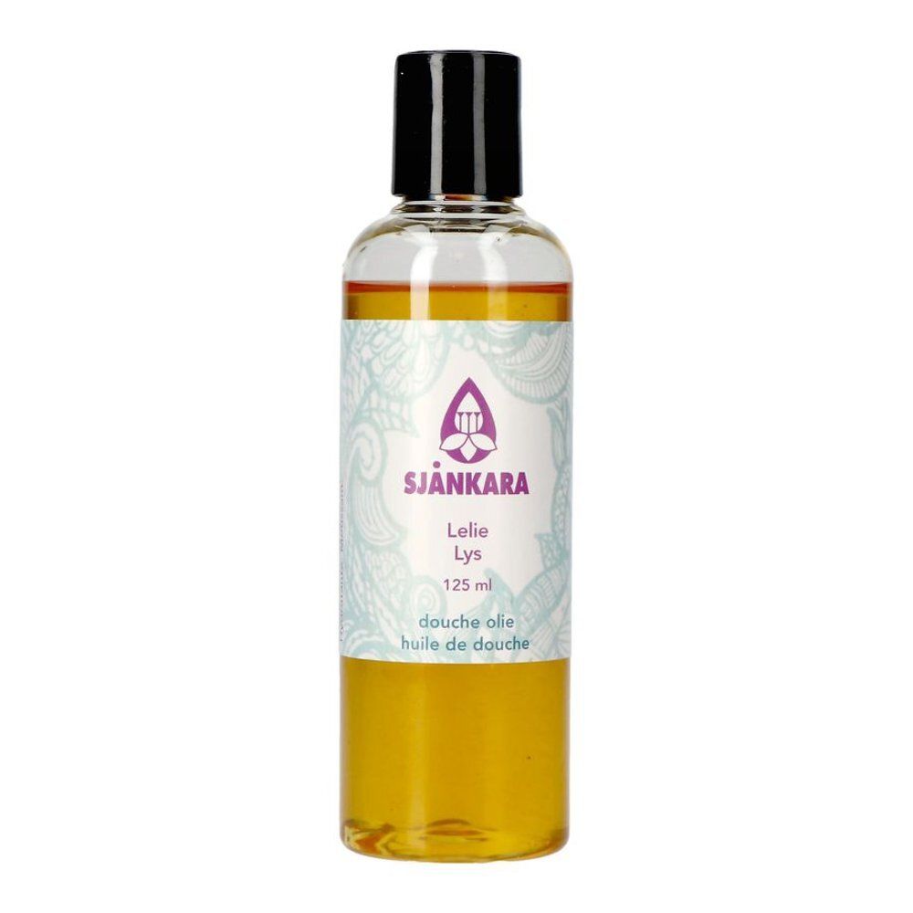 Bouteille transparente avec liquide jaunâtre et bouchon noir. Étiquette avec logo et nom du produit.