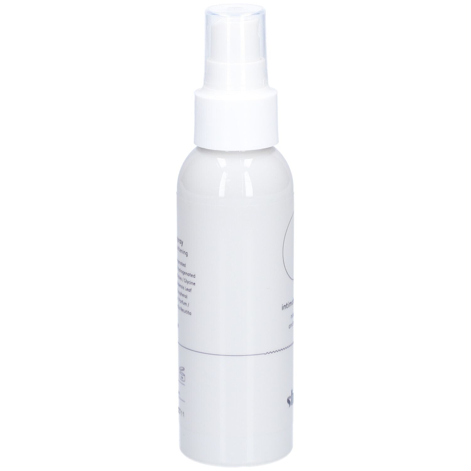 Spray blanc avec tête de pulvérisation. Inscription : intimate oil spray, nourishing and softening. Marque : shinn. Texte au dos.