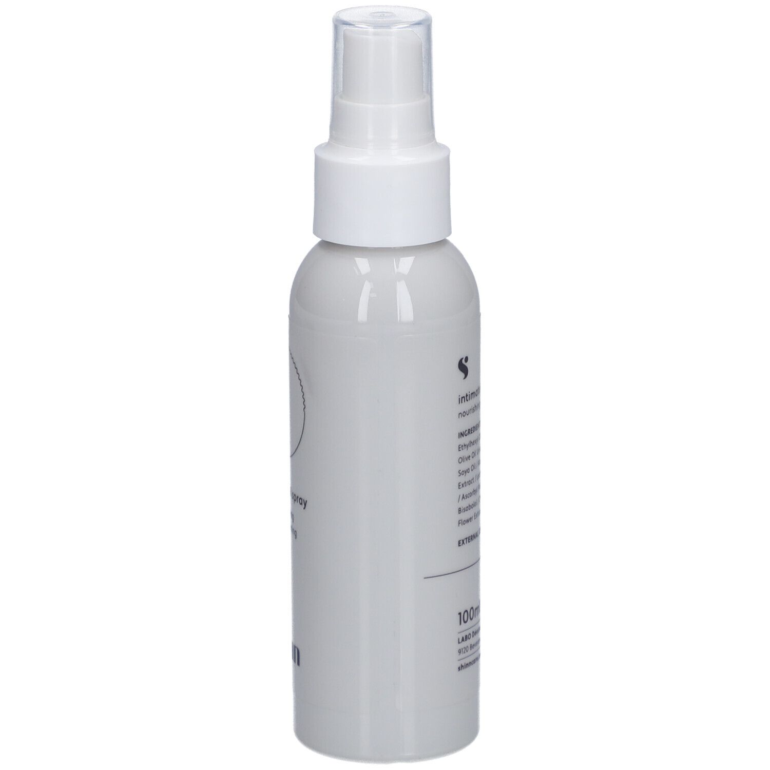 Spray blanc avec tête de pulvérisation. Inscription : intimate oil spray, nourishing and softening. Marque : shinn. Texte au dos.