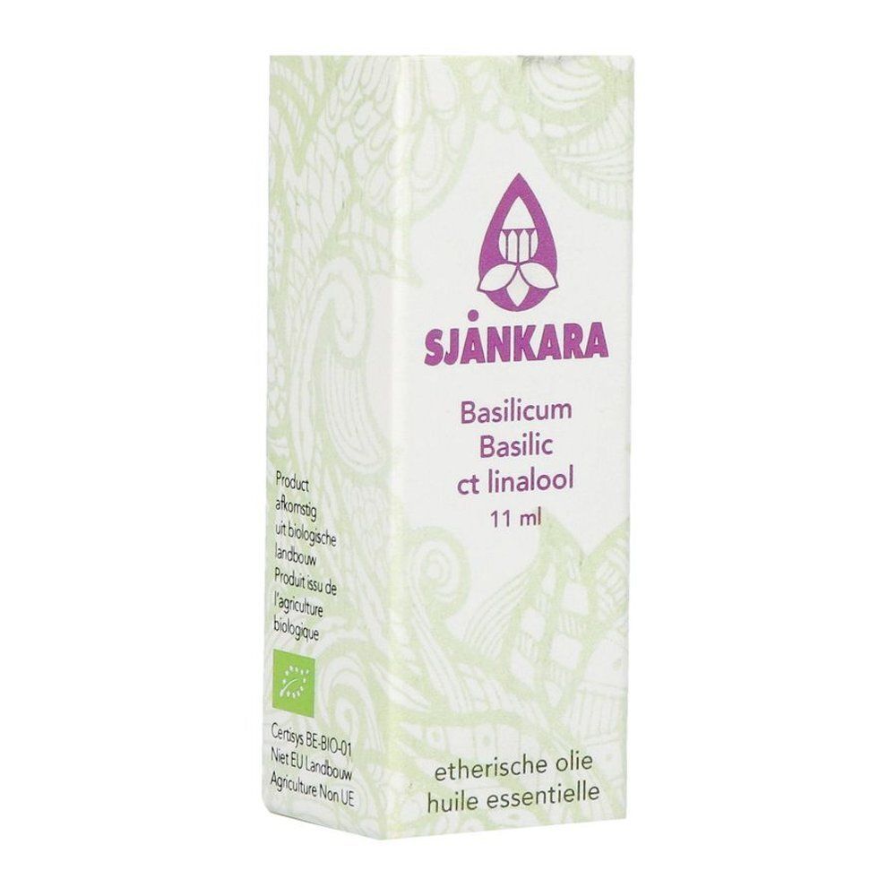 Flacon en verre brun avec bouchon noir. Étiquette avec nom du produit et logo. 11 ml. Label bio.