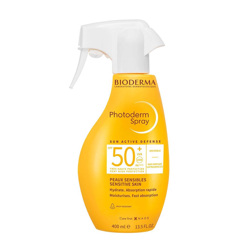 Flacon spray jaune avec tête blanche. Inscription: Bioderma Photoderm Spray SPF50+ pour peaux sensibles.
