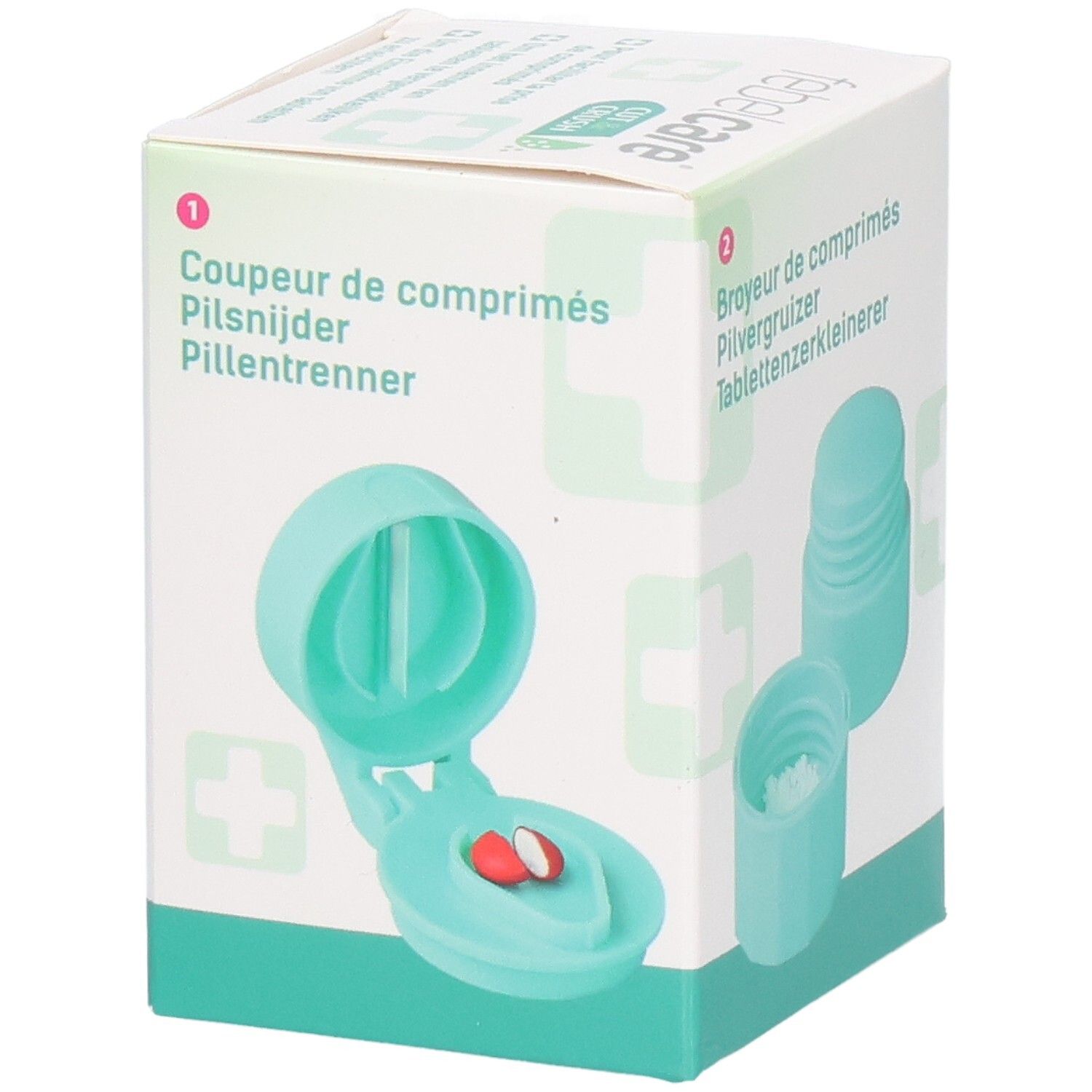 Boîte de Febelcare Cut & Crush. Coupe-comprimés et broyeur. Turquoise. Comprimé dans le coupe-comprimés.