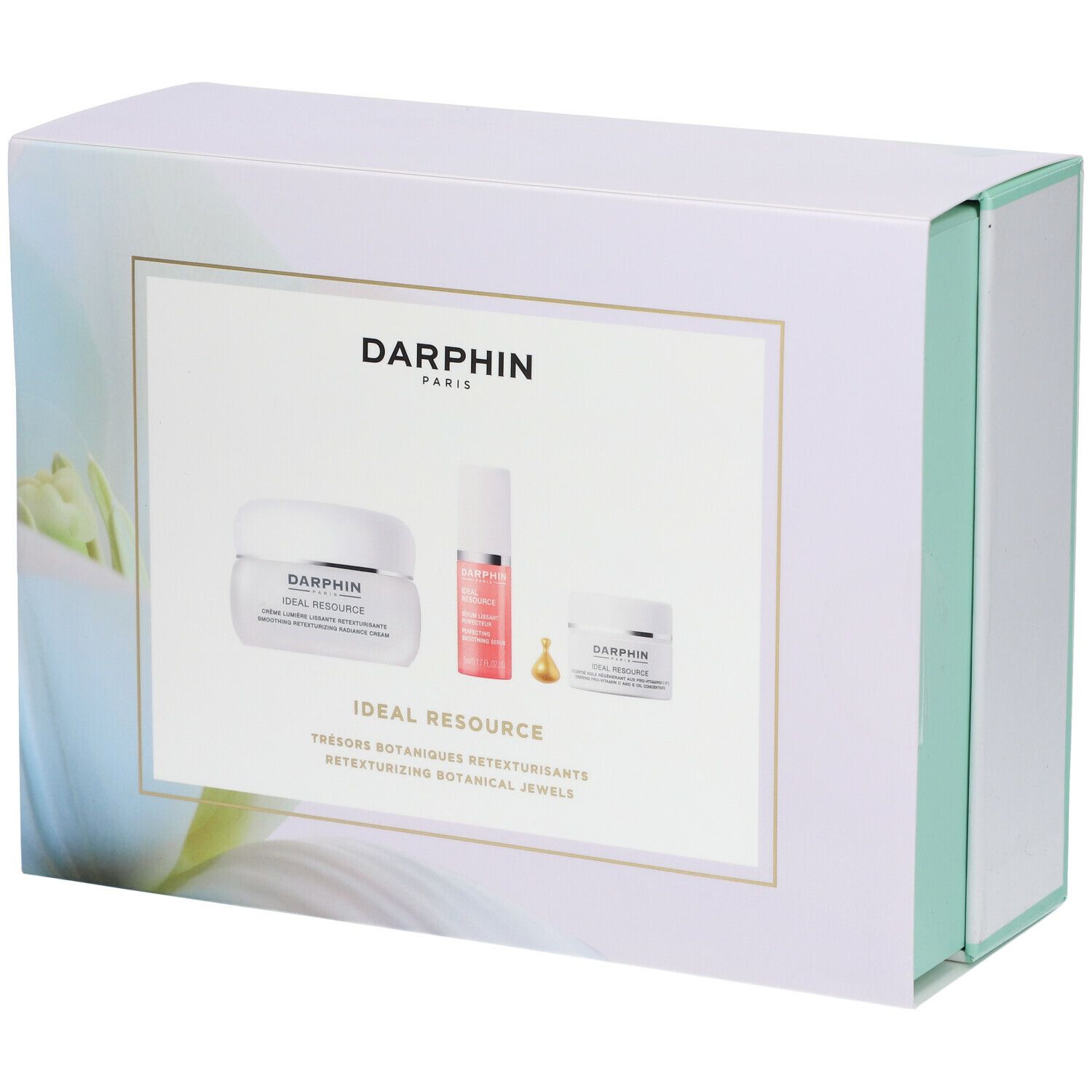 Coffret cadeau avec trois produits cosmétiques. Boîte blanche avec images de produits et texte DARPHIN.