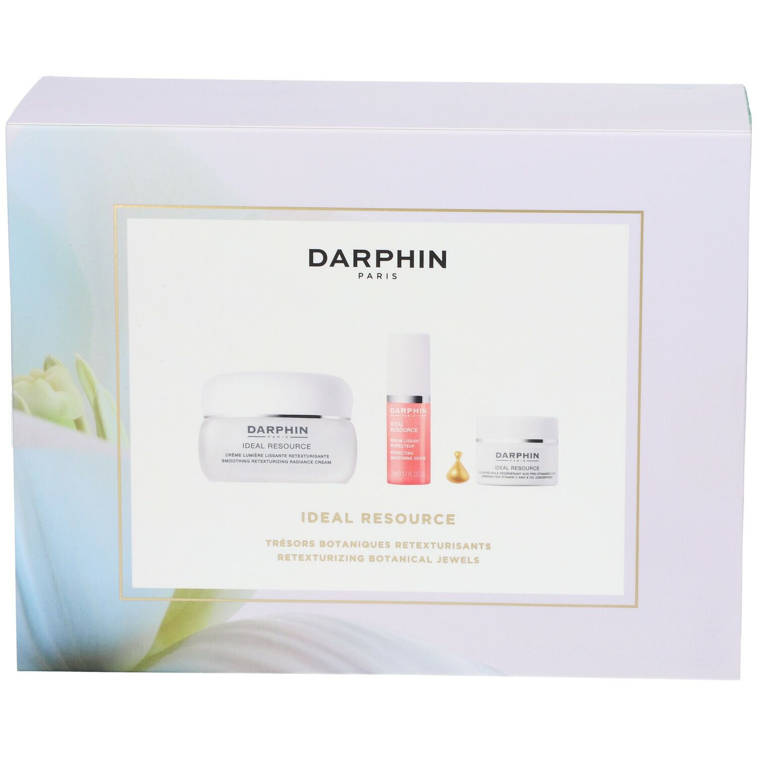 Coffret cadeau avec trois produits cosmétiques. Boîte blanche avec images de produits et texte DARPHIN.