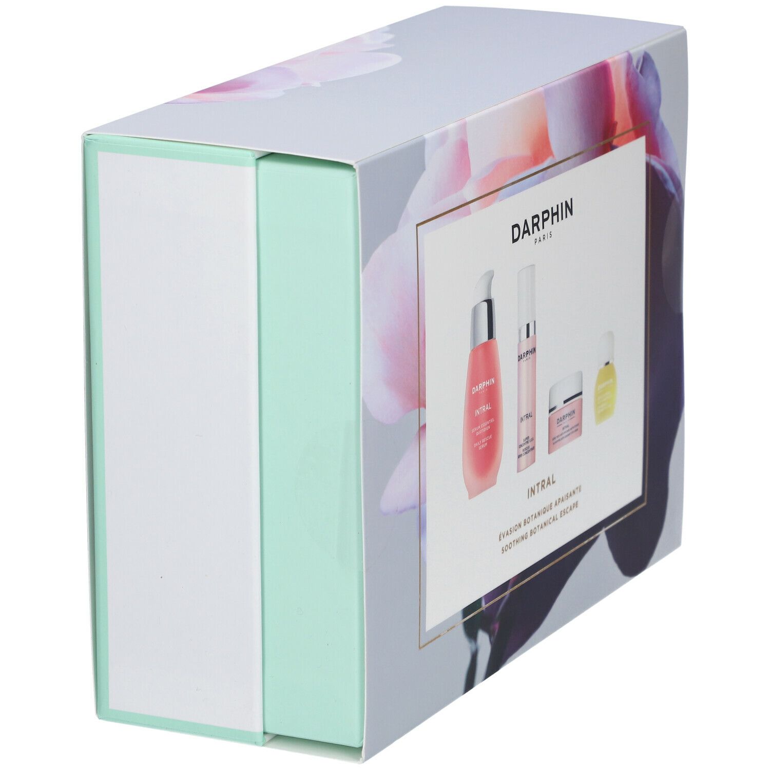 Coffret cadeau avec motif floral et quatre produits. Inscription : DARPHIN. Liquides et crèmes roses. Accents vert menthe et blancs.