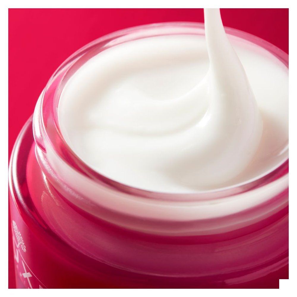 Pot Nuxe Merveillance Lift Crème Velours Effet Liftant avec couvercle argenté et corps rouge.