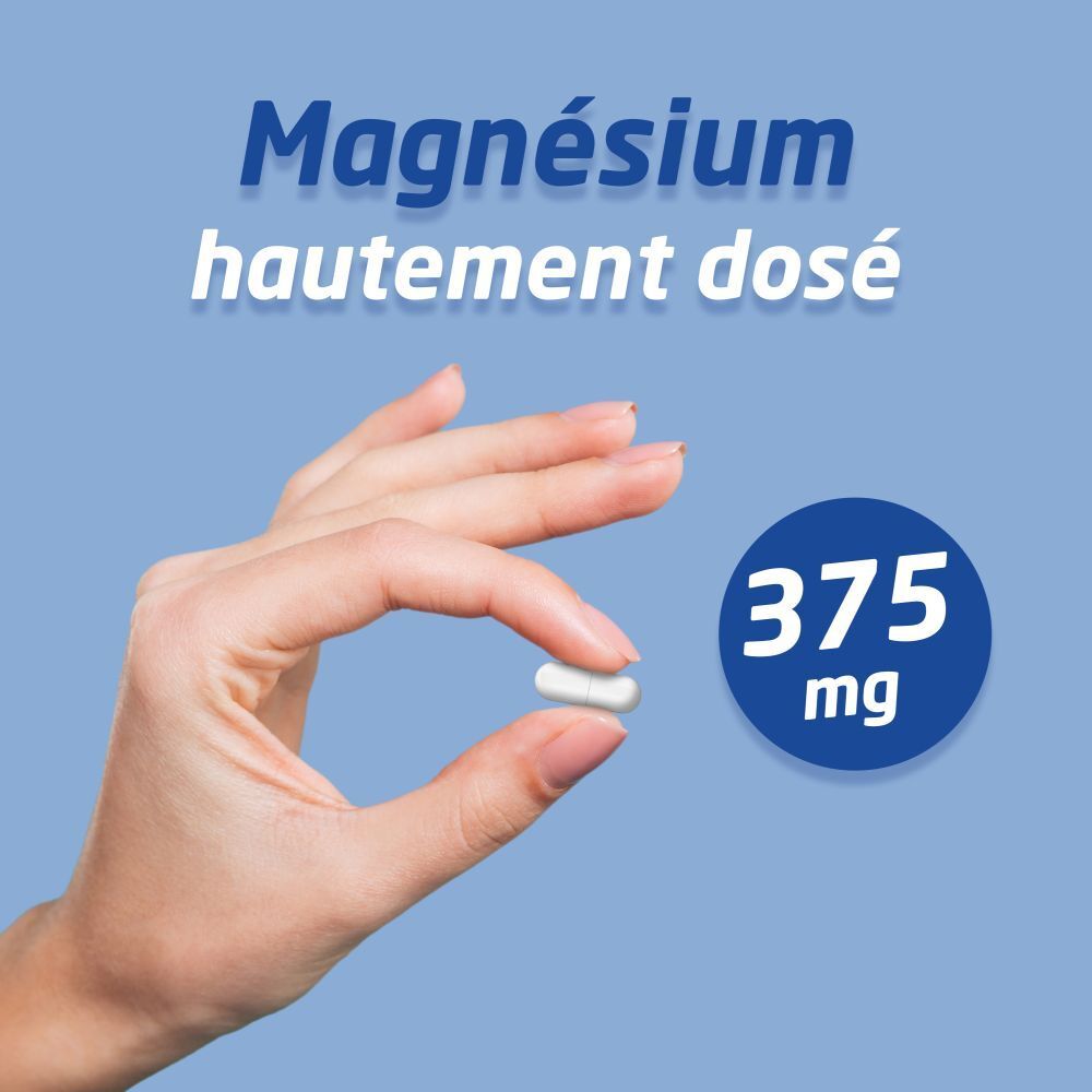 Main tenant un comprimé. Inscription : 'Magnésium fortement dosé' et '375 mg'.