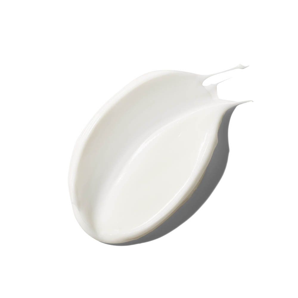 Un échantillon de texture de crème blanche de la crème contour des yeux Clinique Smart Clinical Repair.