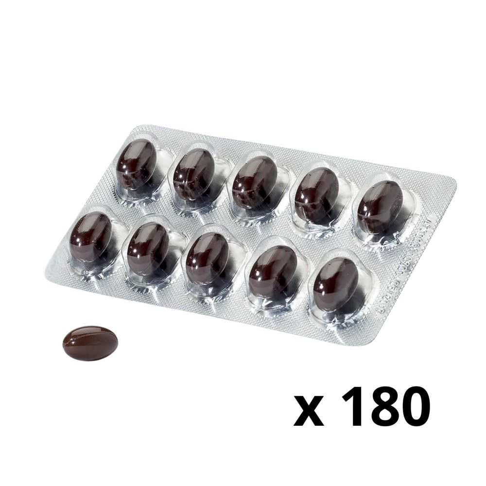 Blister de gélules brunes. Une gélule seule à côté.