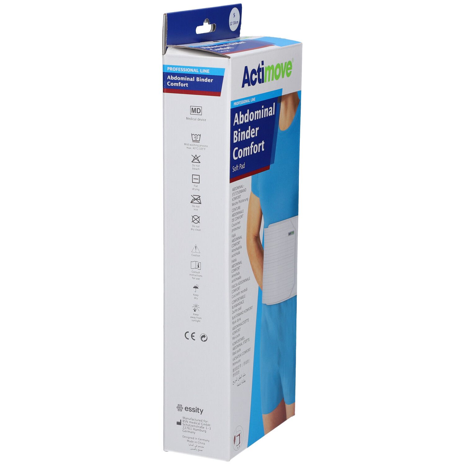Emballage Actimove Abdominal Binder Comfort. Inscription: Abdominal Binder Comfort, Soft Pad. Vue latérale avec symboles de lavage et marquage CE.
