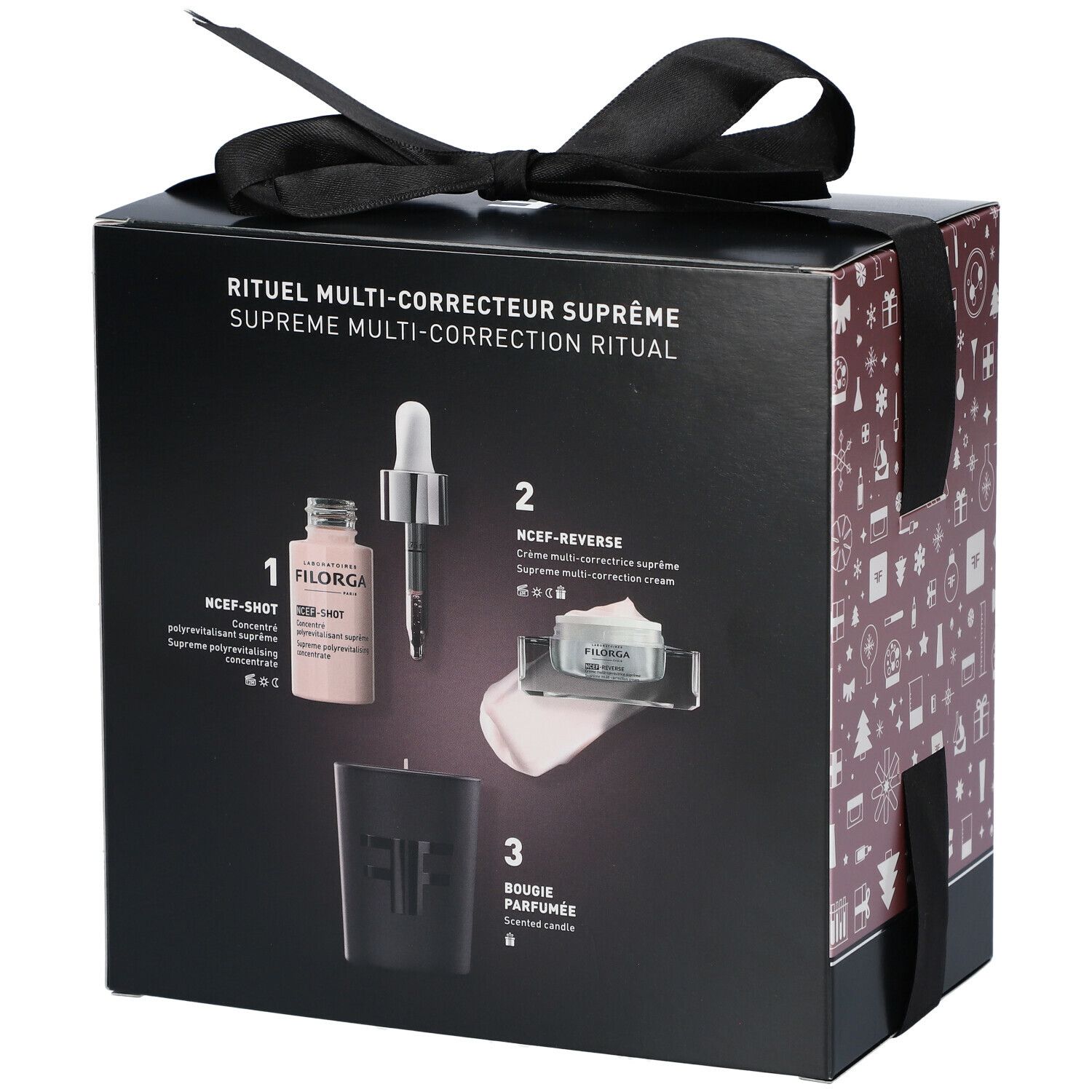 Coffret cadeau avec ruban noir. Contient sérum, crème et bougie. Inscription: Filorga, NCEF-Reverse.