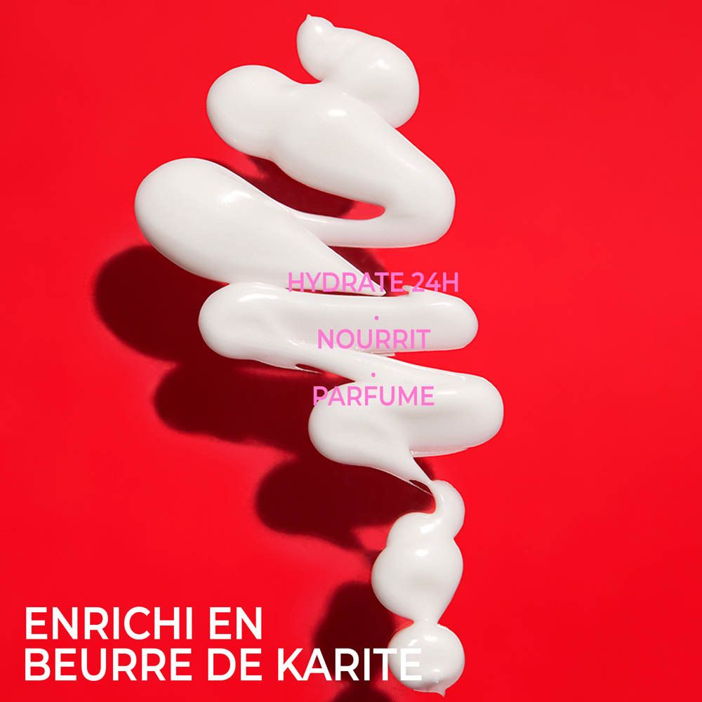 Crème sur fond rouge. Texte: Hydrate 24H, Nourrit, Parfume. Enrichi en beurre de karité.