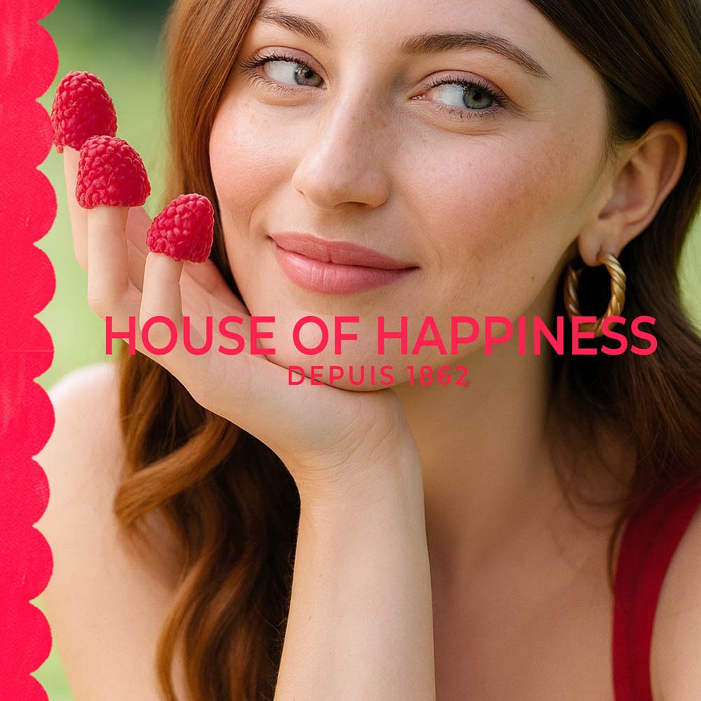 Femme avec framboises. Texte: House of Happiness, Depuis 1862.