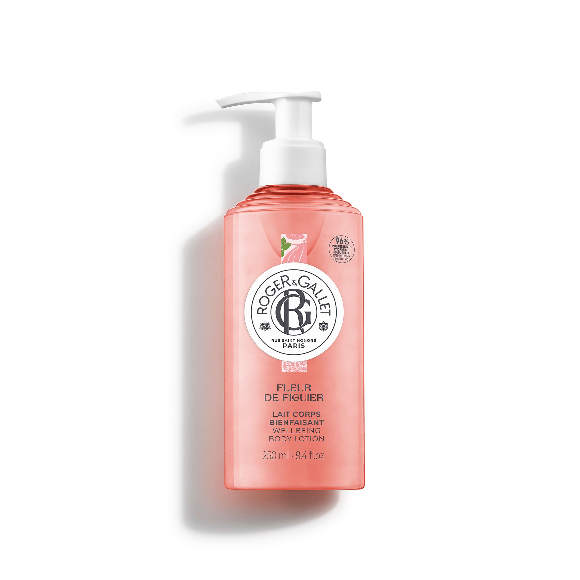 Flacon rose avec pompe blanche. Inscription: Roger & Gallet, Fleur de Figuier, Lait Corps Bienfaisant, 250 ml.