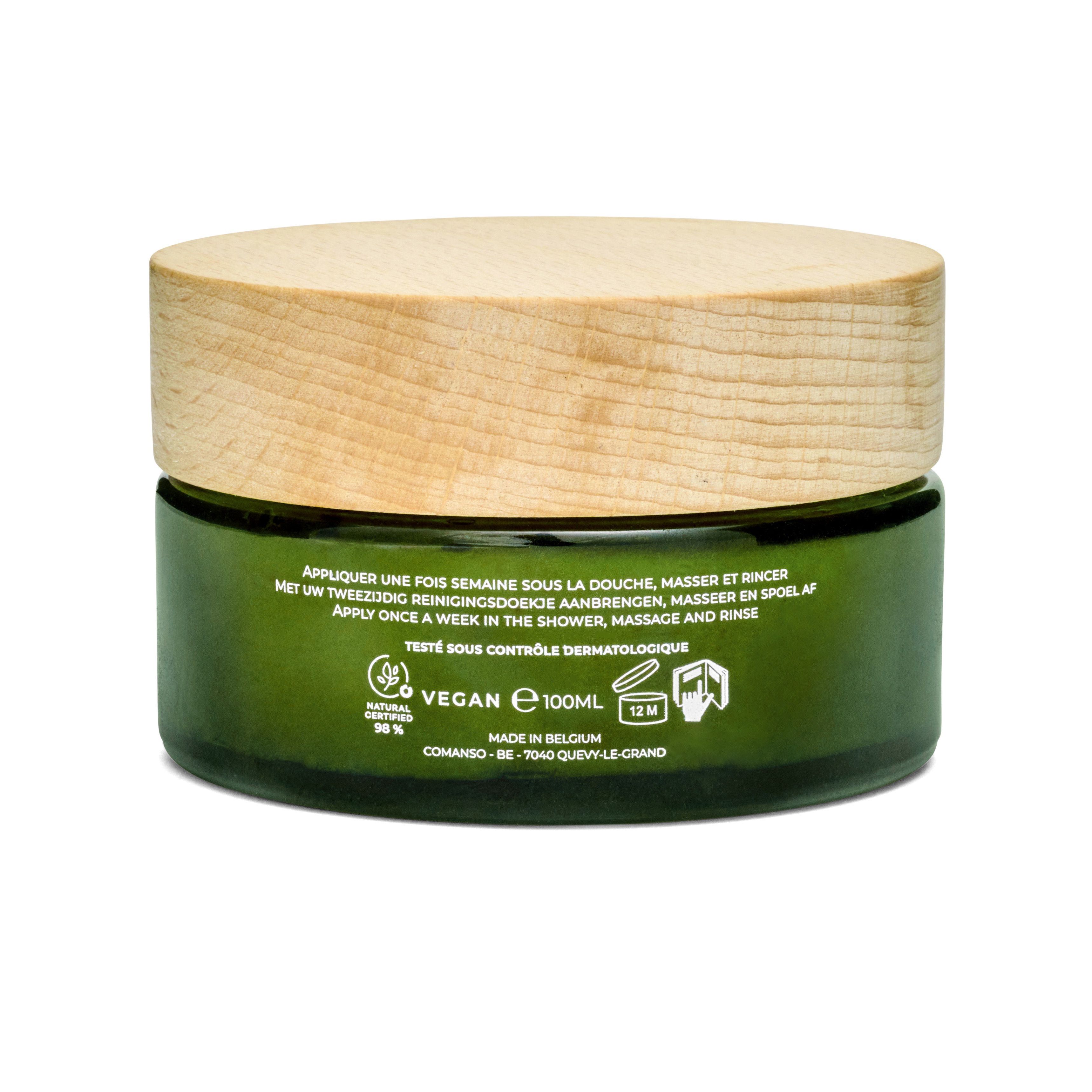 Dos d'un pot en verre vert avec couvercle en bois. Texte: application, vegan, 98% naturel, Fabriqué en Belgique.