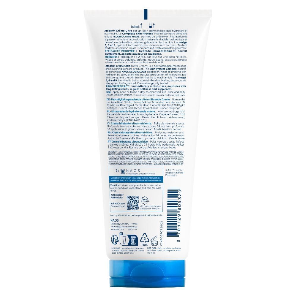 Dos d'un tube blanc avec bouchon bleu. Texte multilingue. Code QR et symboles de recyclage.