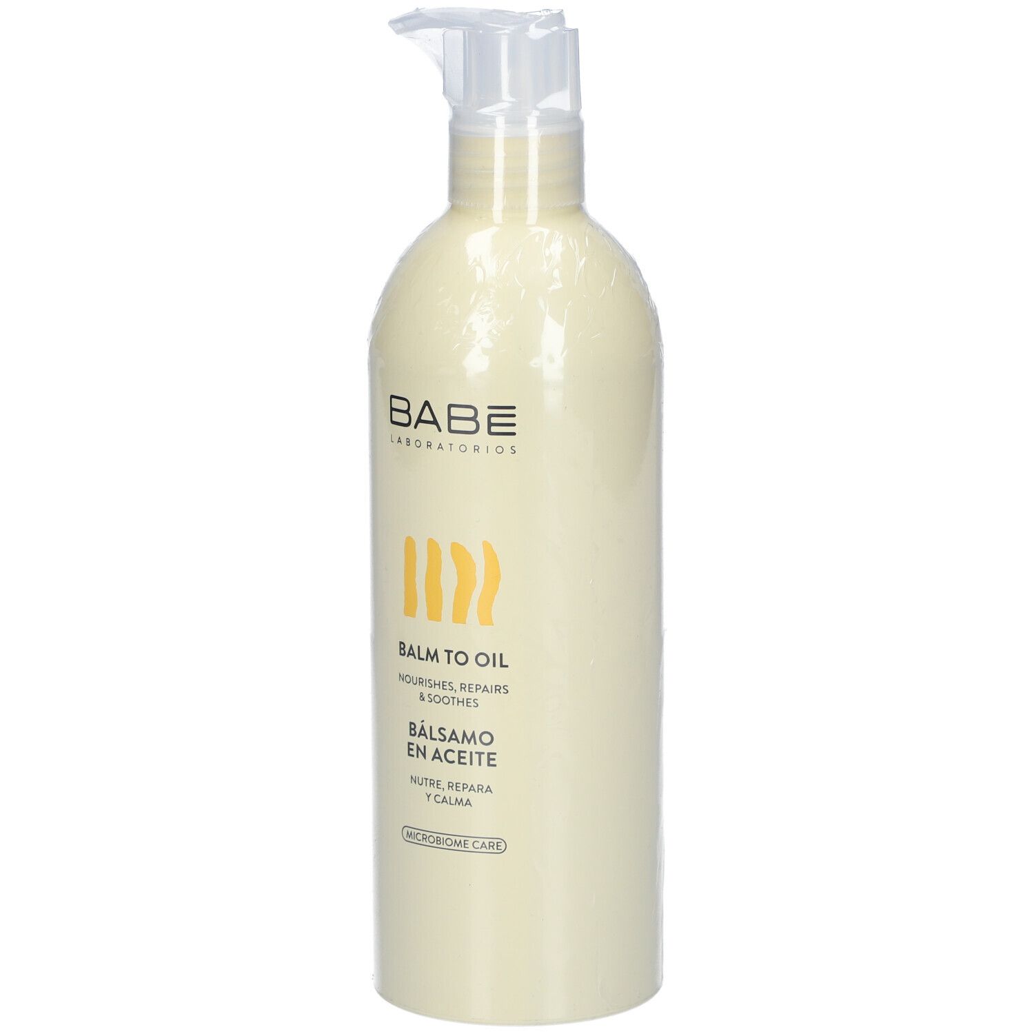 Flacon beige avec pompe. Inscription: BABE Laboratorios, Balm to Oil, nourrit, répare & apaise.