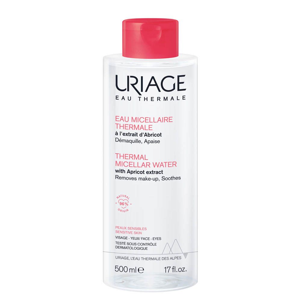Visage d'une femme. Coton démaquillant la peau. Textes: Efficace sur le maquillage waterproof, fini non gras.