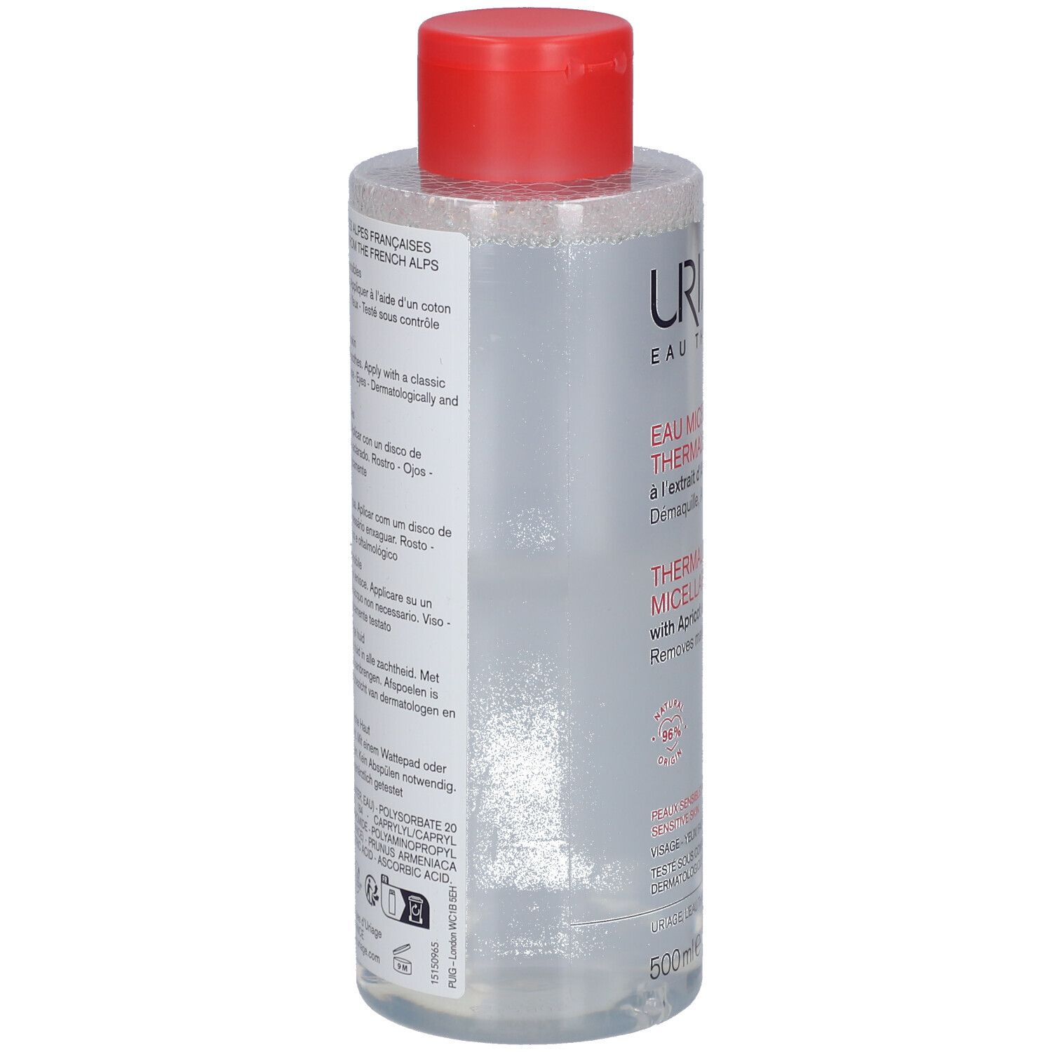 Flacon transparent, bouchon rouge. Inscription: Uriage Eau Micellaire Thermale. Extrait d'abricot. Pour peaux sensibles.