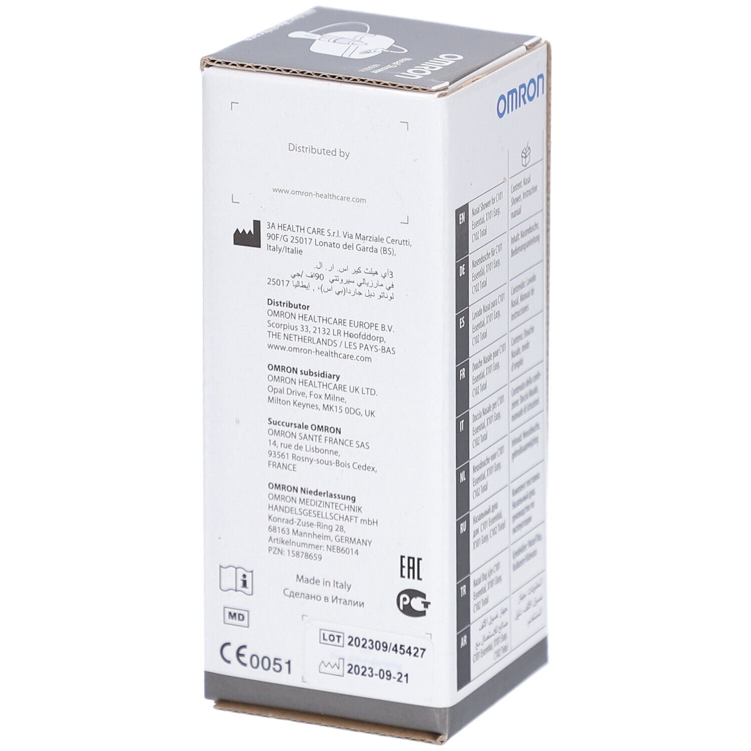 Dos de l'emballage de la douche nasale Omron. Adresses et informations sur le fabricant et la distribution.