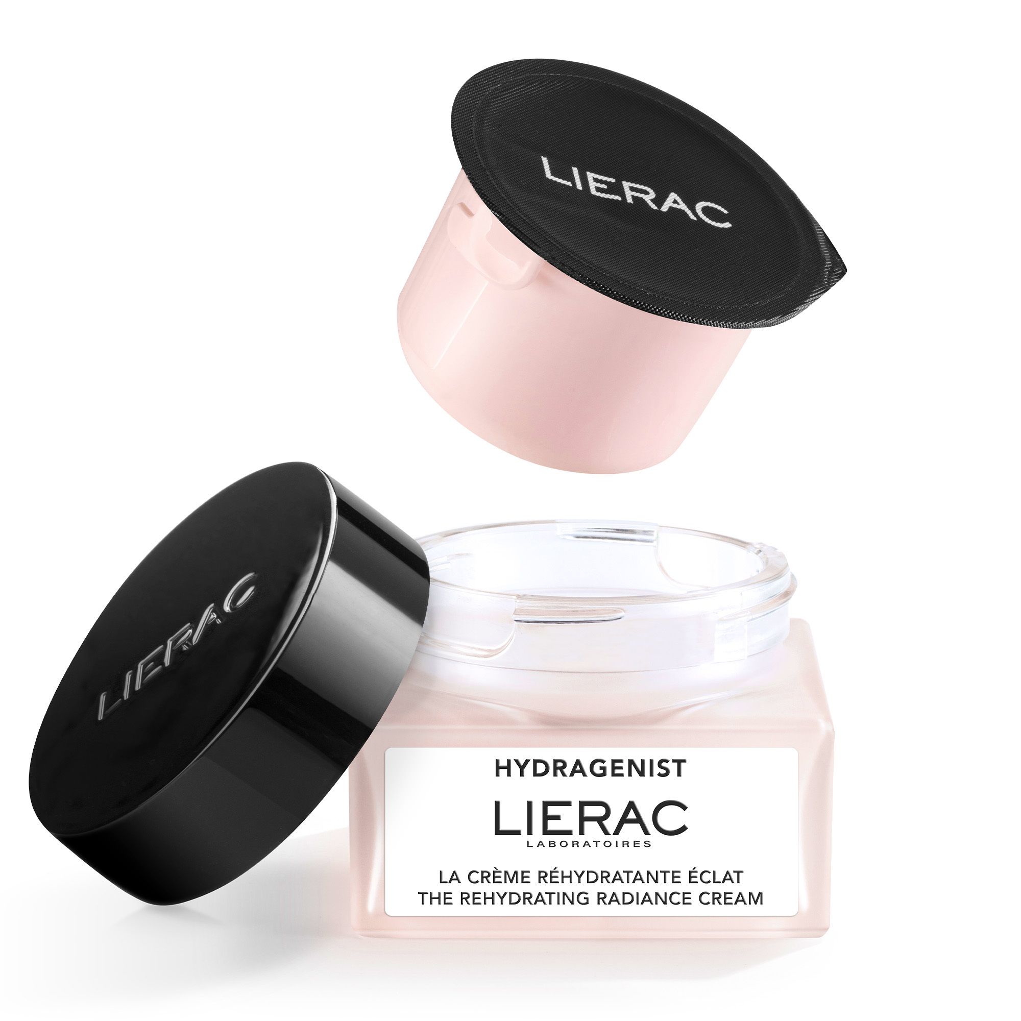 Pot de crème avec couvercle et récipient rose. Marque: LIERAC. Récipient rempli de crème. Couvercle ouvert.