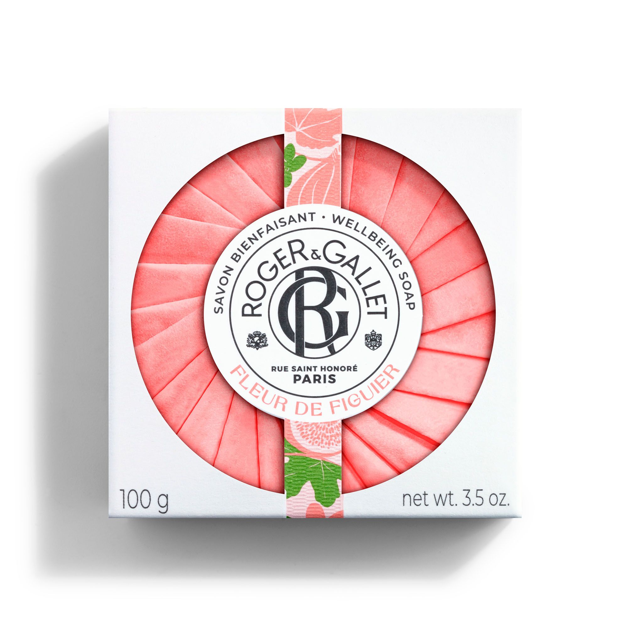 Savon rond rose avec inscription: Roger & Gallet, Fleur de Figuier. Gros plan.