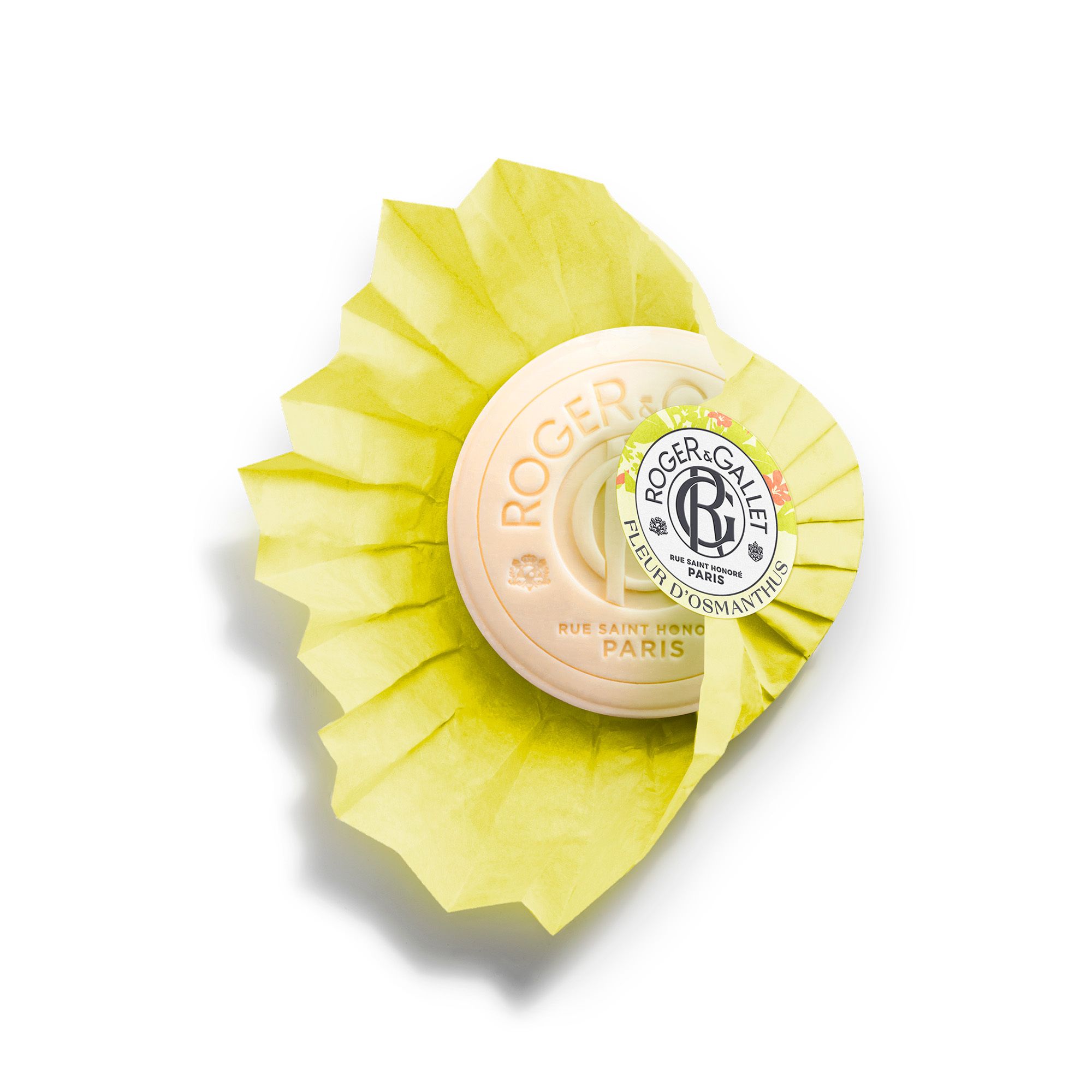 Savon jaune. Forme ronde, emballé. Inscription: Roger & Gallet, Fleur d'Osmanthus.