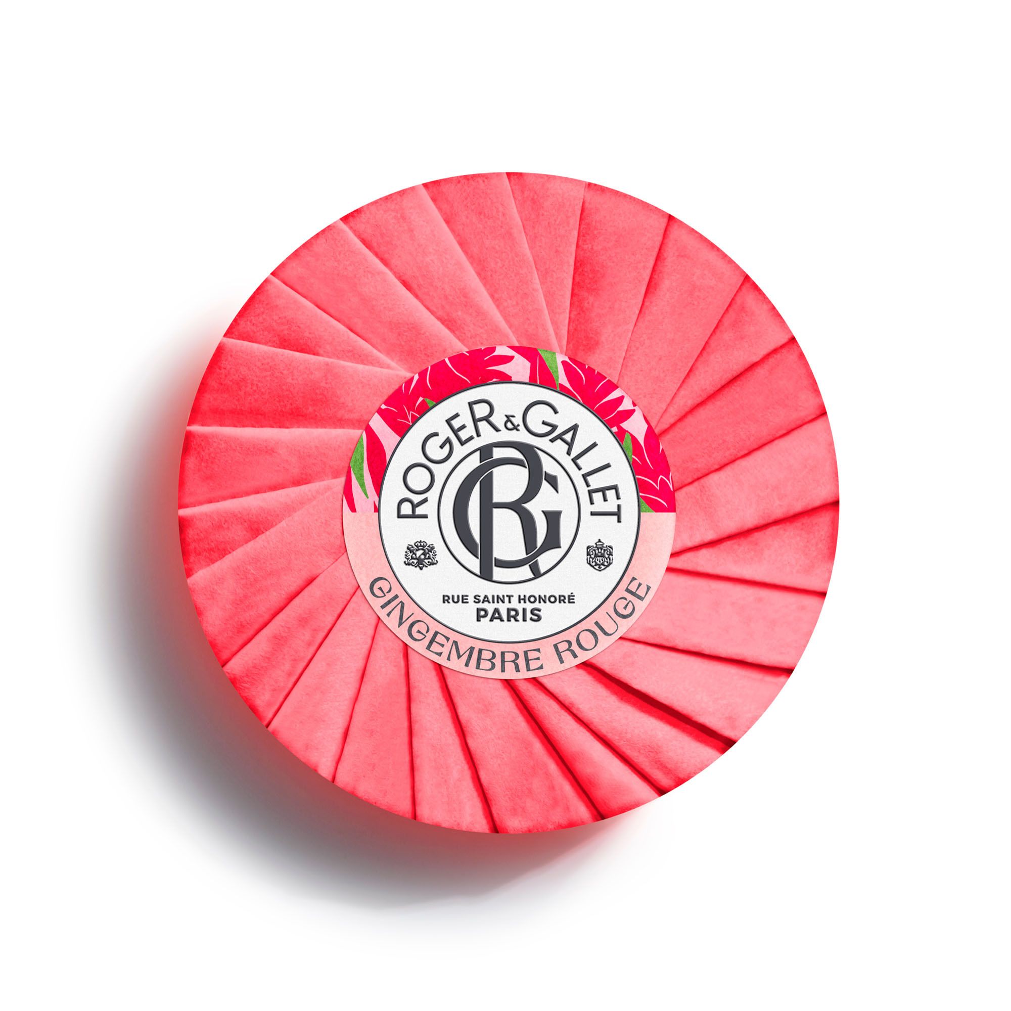 Savon rouge rond. Marque Roger & Gallet, slogan « Gingembre Rouge ». Emballage avec ruban floral.