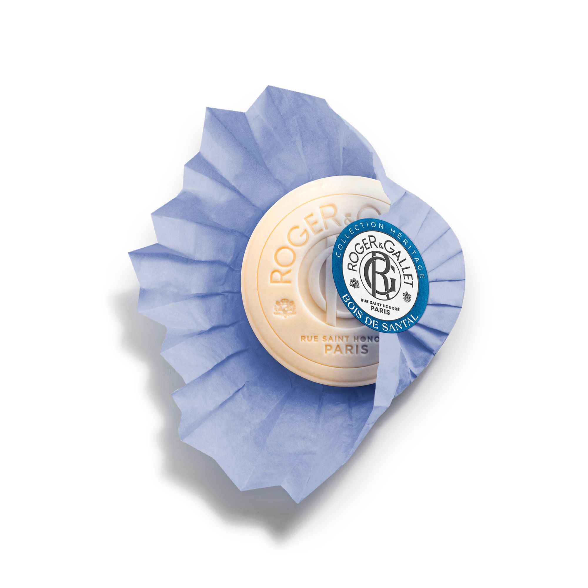 Savon dans papier bleu. Texte: Roger & Gallet, Bois de Santal. Collection Heritage. Forme ronde.