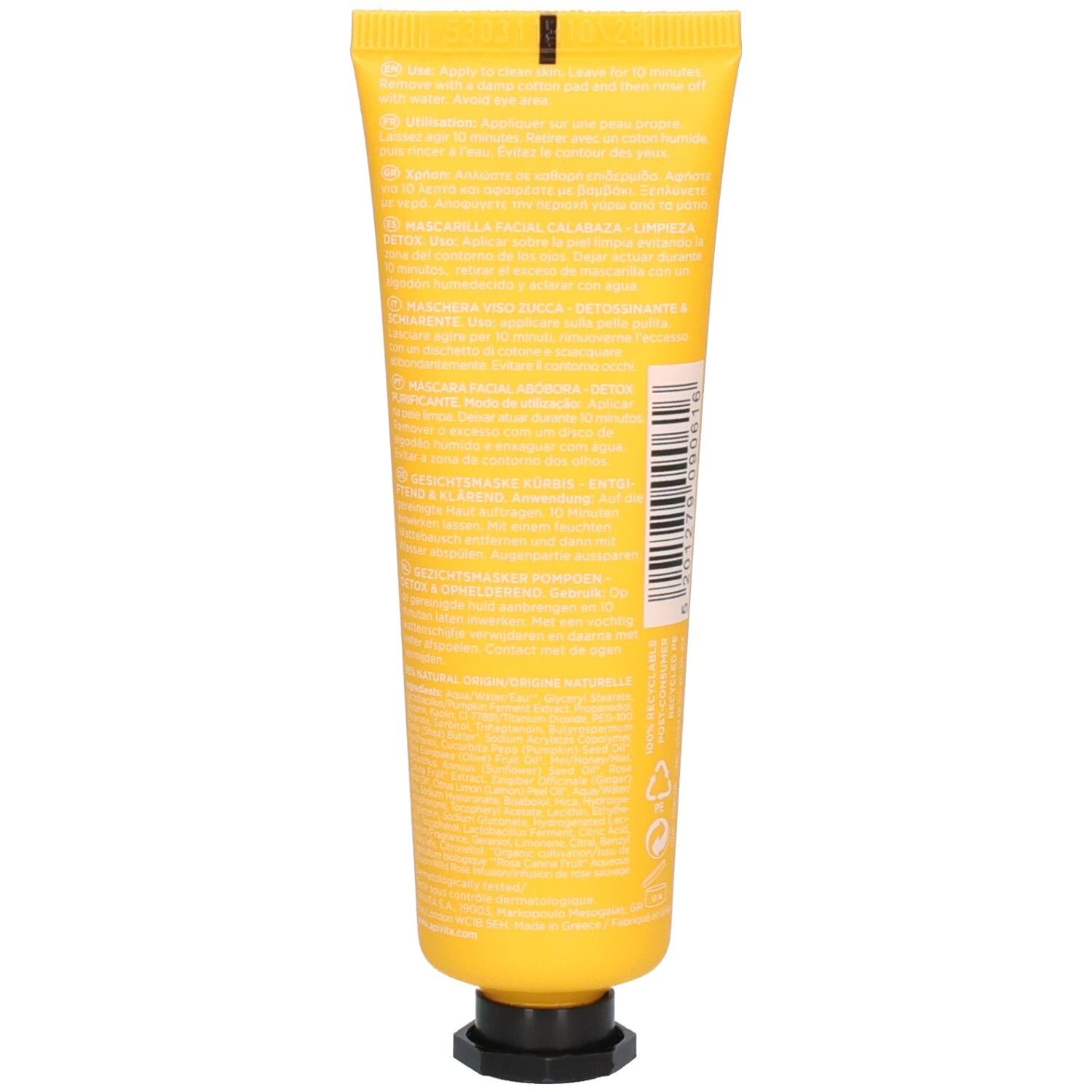 Dos du tube jaune. Texte multilingue. Bouchon noir. Code-barres.
