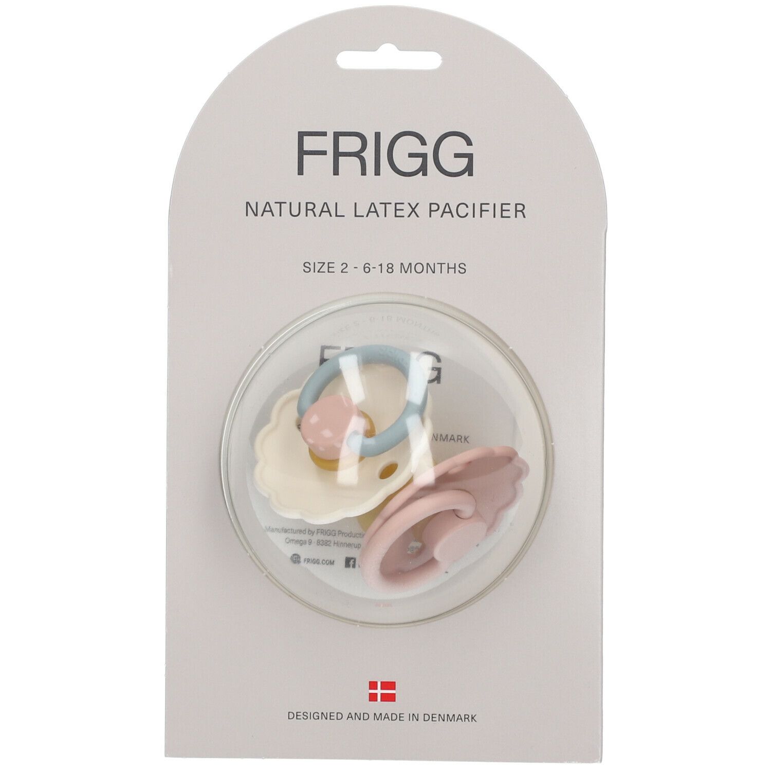 Emballage de trois sucettes. Deux roses, une crème. Texte: FRIGG, NATURAL LATEX PACIFIER, SIZE 2-6-18 MONTHS.