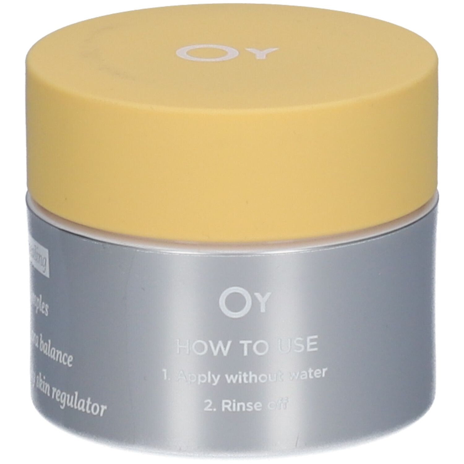 Pot de crème avec couvercle jaune et contenant argenté. Logo OY et instructions d'utilisation visibles.