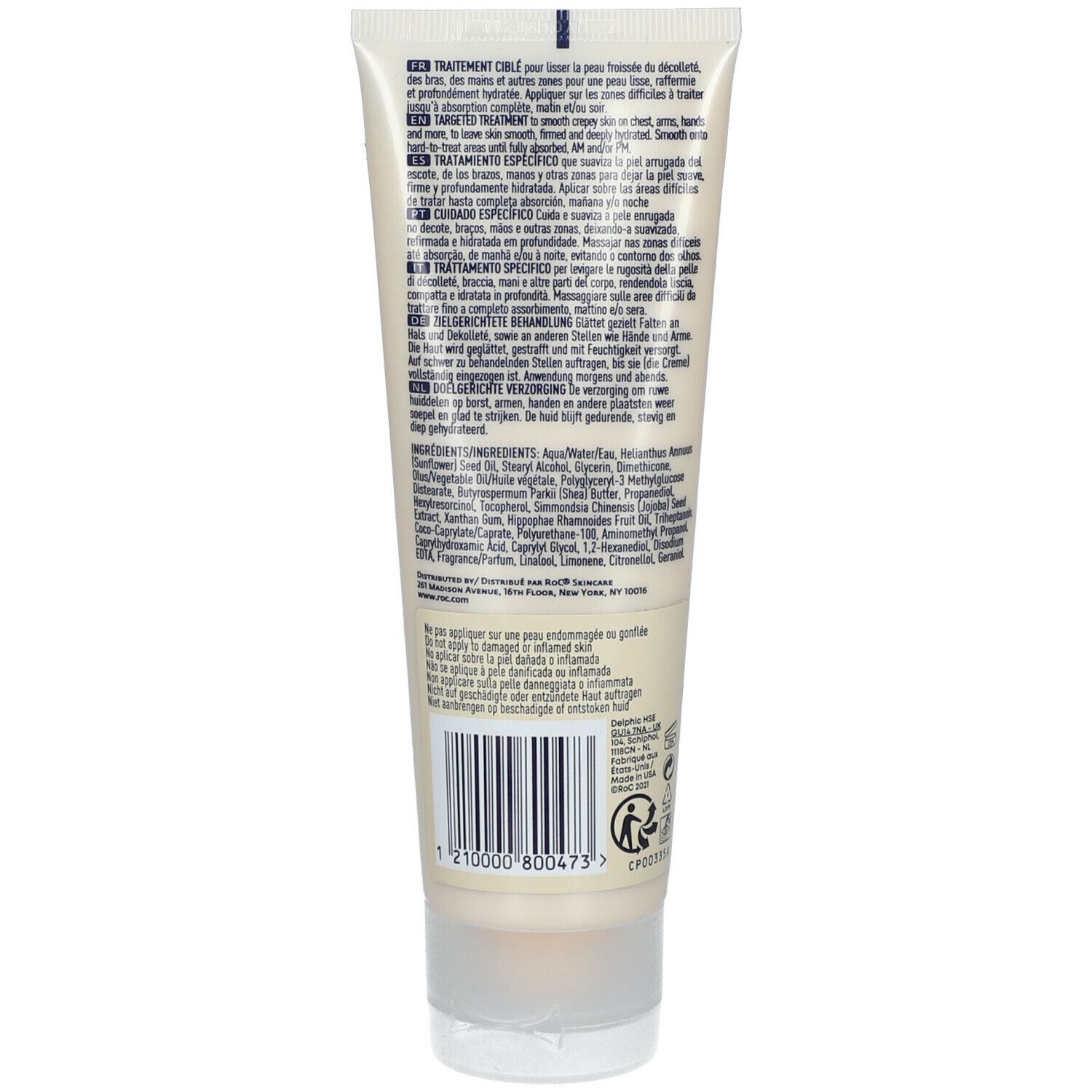 Tube de crème beige. Texte multilingue au dos. Code-barres et informations fabricant.