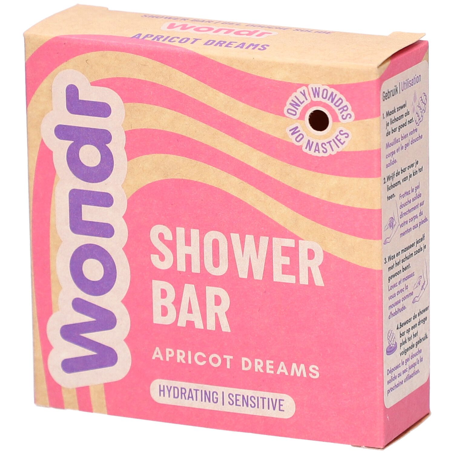 Barre de douche Wondr Apricot Dreams. Emballage rose à motifs ondulés. Inscription : Shower Bar, Hydratant, Sensible.