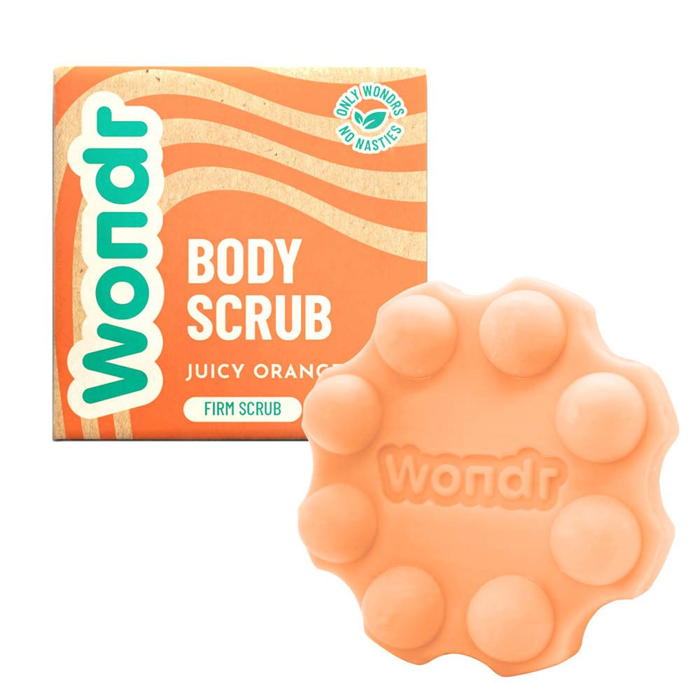 Wondr Body Scrub Juicy Orange et produit. Savon orange avec emballage. Forme ronde.