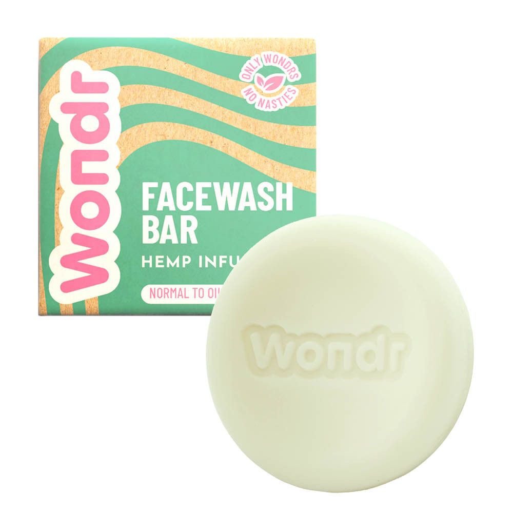 Savon rond et emballage en carton. Savon avec logo "Wondr". Emballage avec "Facewash Bar" et "Hemp Infusion".