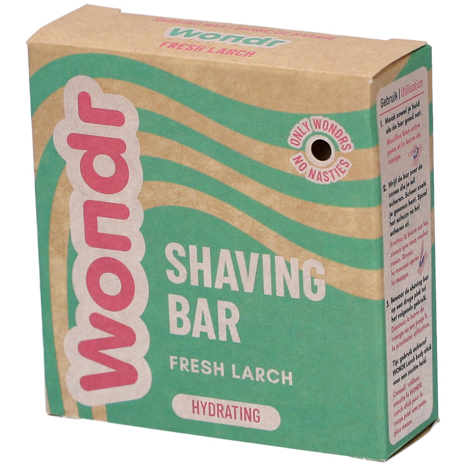 Boîte en carton Wondr. Inscription 'Shaving Bar Fresh Larch'. Motif vagues vert et beige.