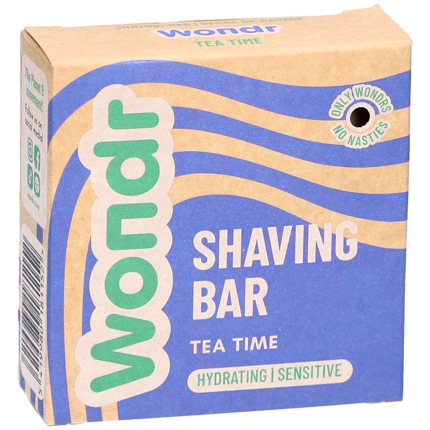 Boîte en carton avec vagues bleues et texte. Contient "Shaving Bar Tea Time". Marque : Wondr. Inscription : Hydrating | Sensitive.