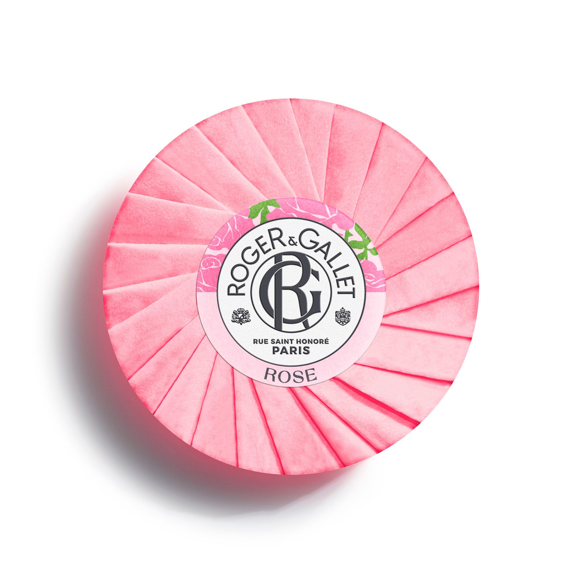 Savon rond rose dans papier rose. Logo et texte ROSE. Vue de dessus.
