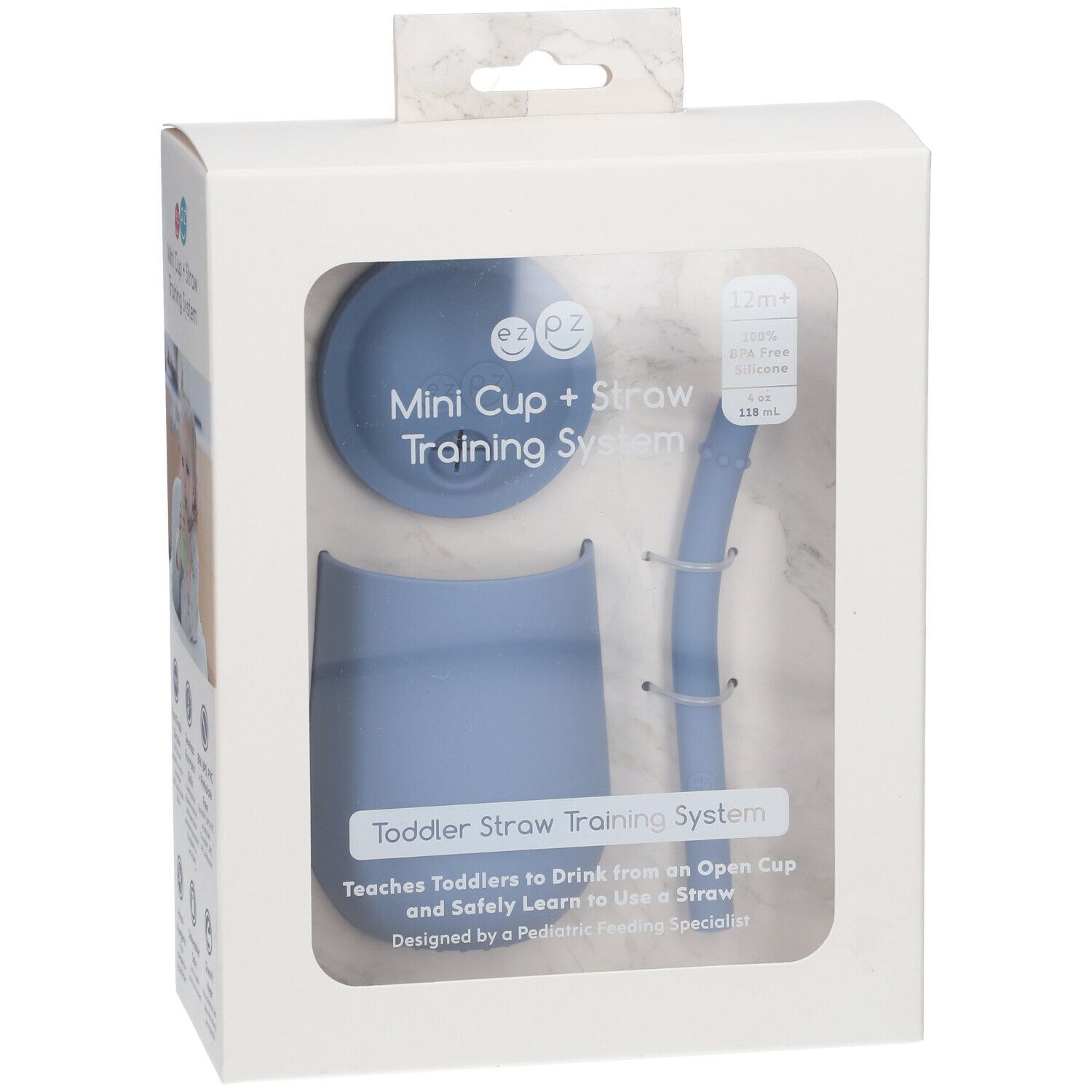 Emballage avec mini-gobelet bleu, couvercle et paille. Texte : Mini Cup + Straw Training System.